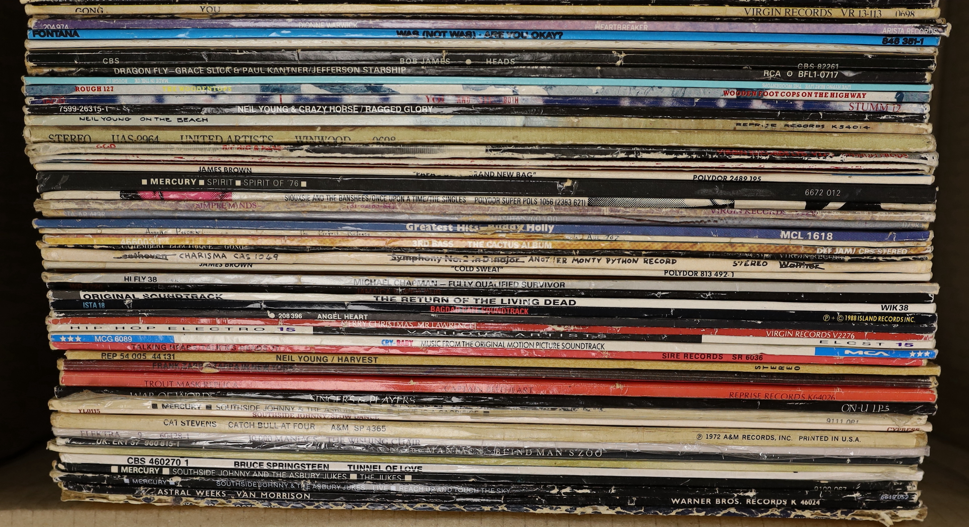 Seventy mostly 1970's/80's LPs, including Focus, Steve Forbert, Aretha Franklin, Dionne Warwick, Dire Straits, Simple Minds, Neil Young, Bruce Springsteen, etc.